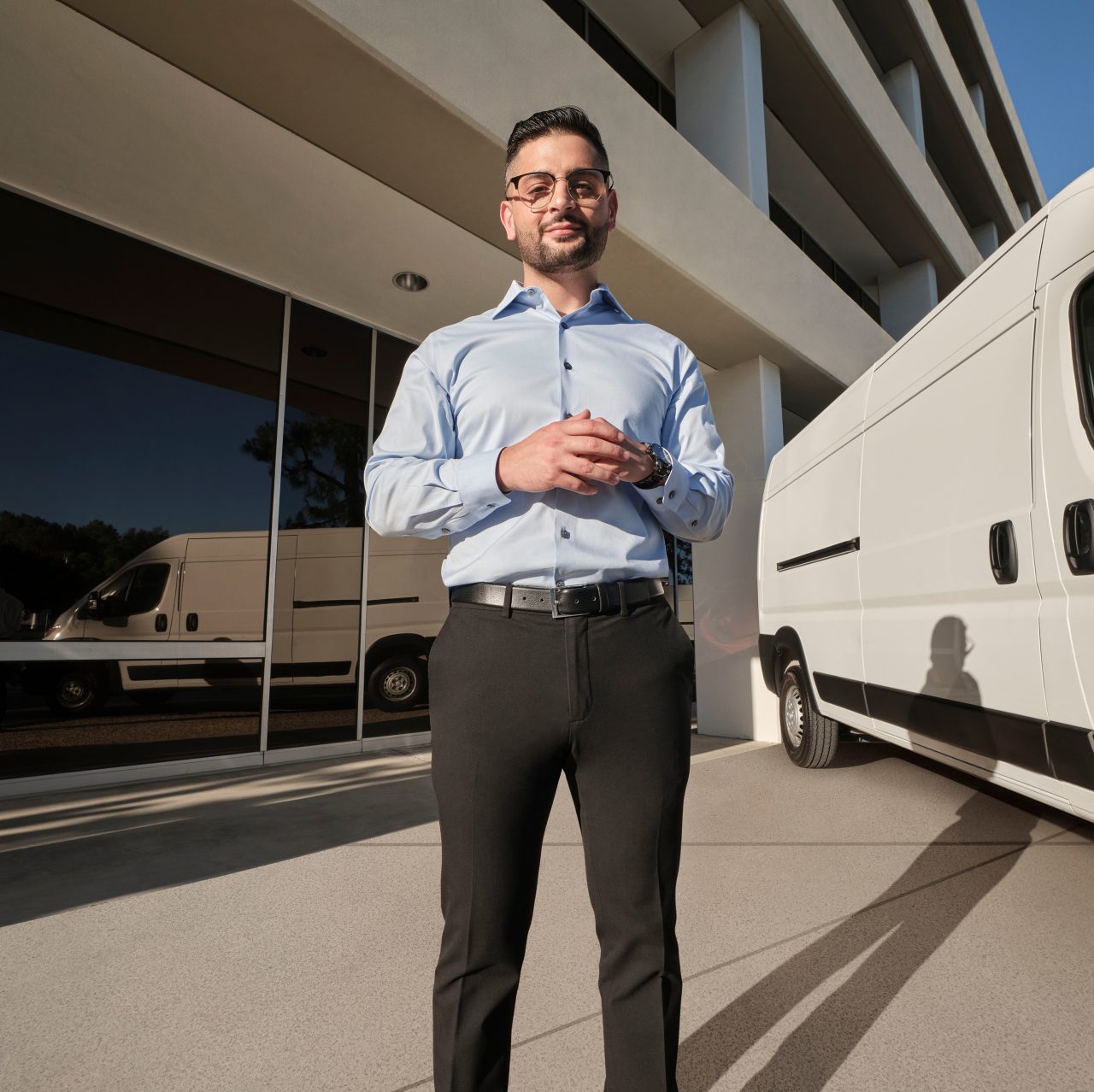 Man standing in front of truck