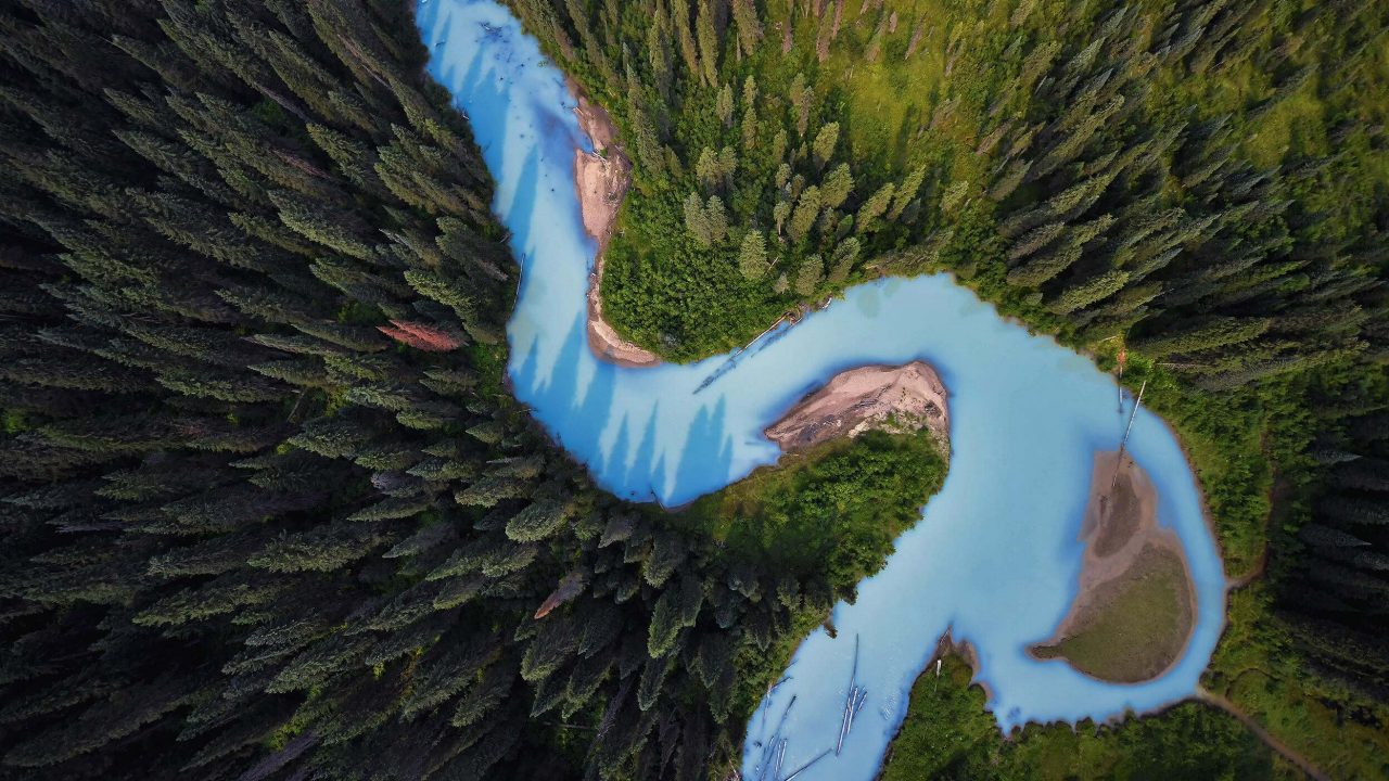 Photo Contest 2018 
Caption: An aerial view of the Holmes River, British Columbia, Canada. 
Photo Credit: © Shane Kalyn/TNC Photo Contest 2018
Photographer’s Statement: "River Runs Through It." As we flew over the beautiful Holmes River, the glacial waters contrasted nicely with the forest - the waters extra blue due to increased glacial melt.
 