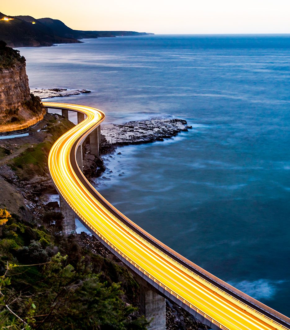 Picture of a road along a body of water